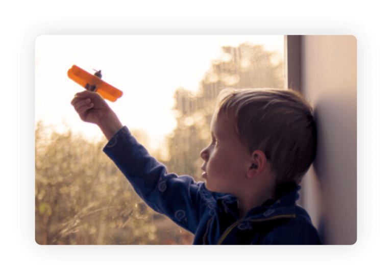 Young boy with airplane